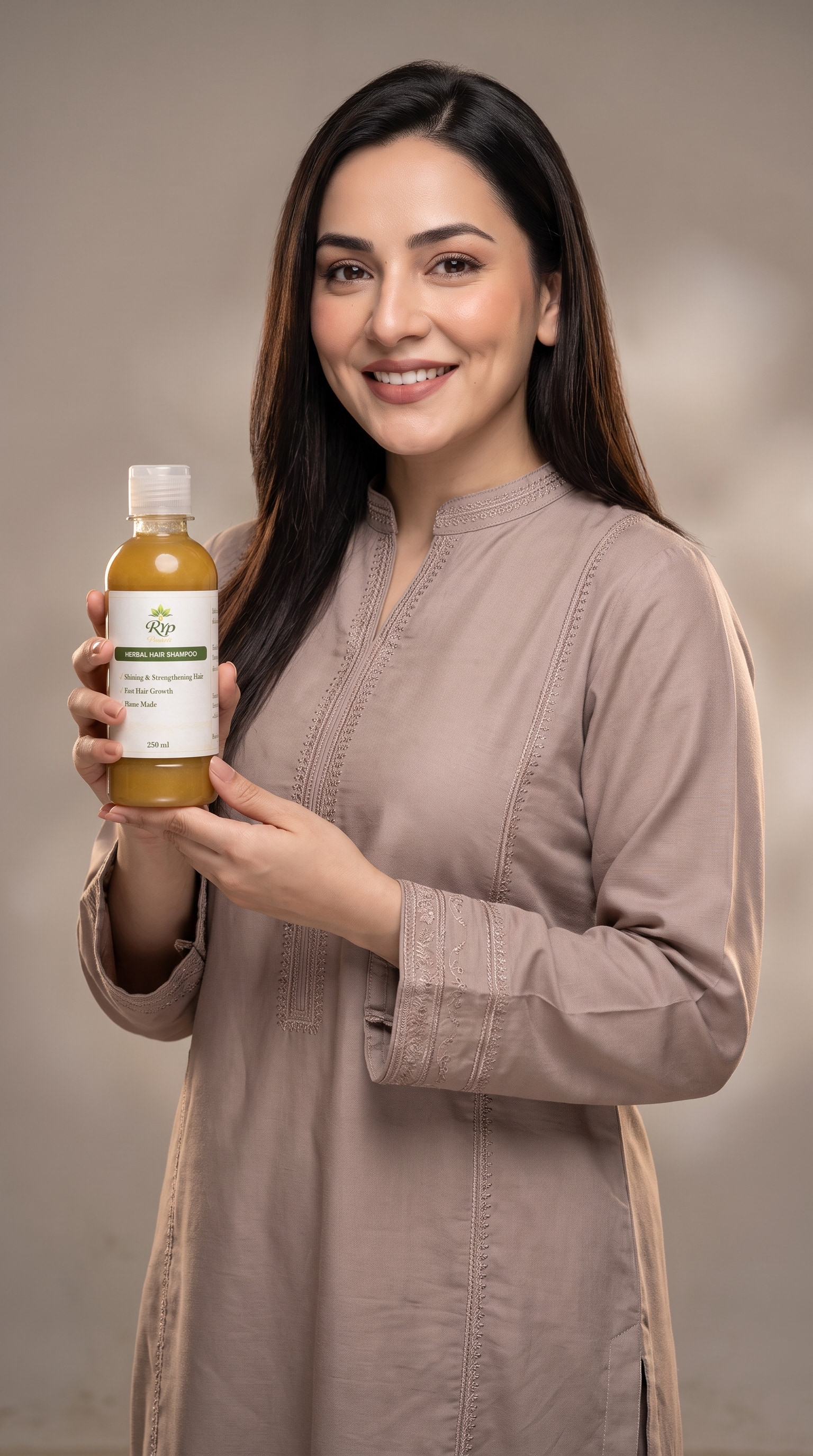 RYP customer holding Herbal Hair Shampoo